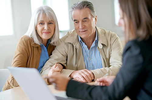 Senior,Couple,Meeting,Financial,Adviser,For,Investment