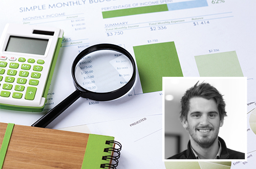 Calculator and magnifying glass on the table